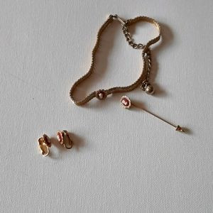 A set of Cameo earrings choker and brooch